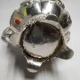 Silver milk jug with gilding in the middle