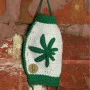 Knitted mask with hemp leaf